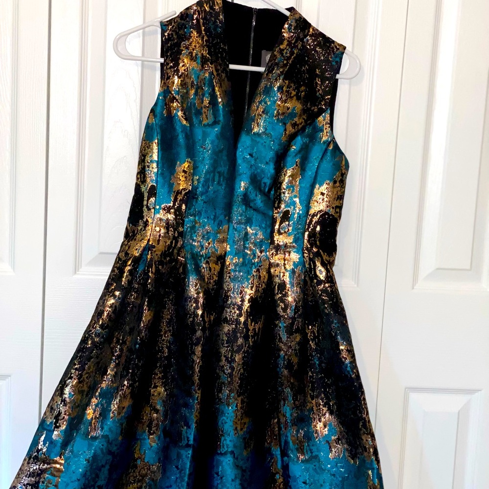 Vince camuto dress with metallic rose gold accent.
